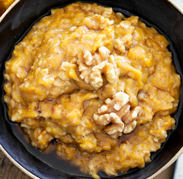 Pumpkin Spice Oatmeal Topped with Walnuts